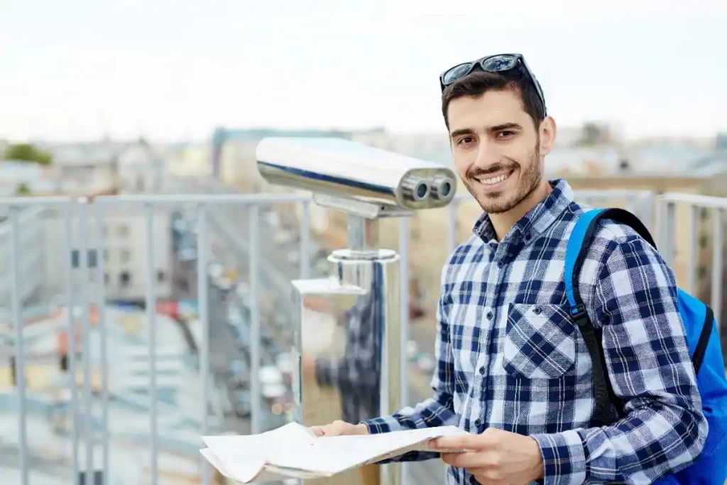 Student exploring a German city with a map, guided by the best German language education consultancy in Kerala.