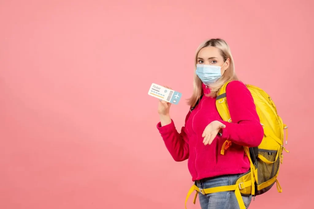 Germany Opportunity Card Eligibility Criteria – traveler holding an airline ticket and passport, representing job seeker visa opportunities in Germany.